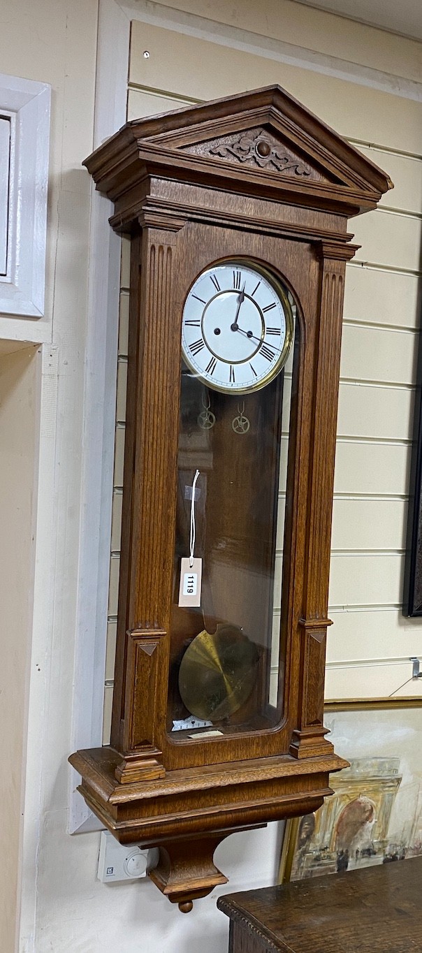 A 19th century German Vienna regulator wall clock, Lenzkirch movement with pendulum and weights, oak case, height 122cm